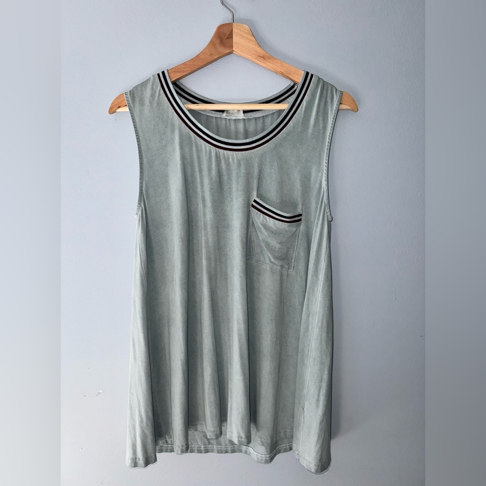 POL mint green long tank-top with navy blue piping around the edges.